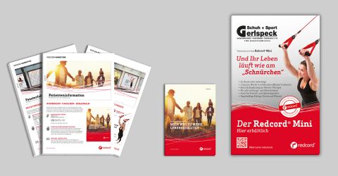 Redcord-Marketingmaterialien mit Broschüren, Patienteninfos und Poster zum Redcord Mini Trainingssystem.