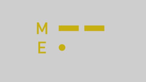 Morsezeichen für M (zwei Striche) und E (ein Punkt) in gold auf grauem Hintergrund