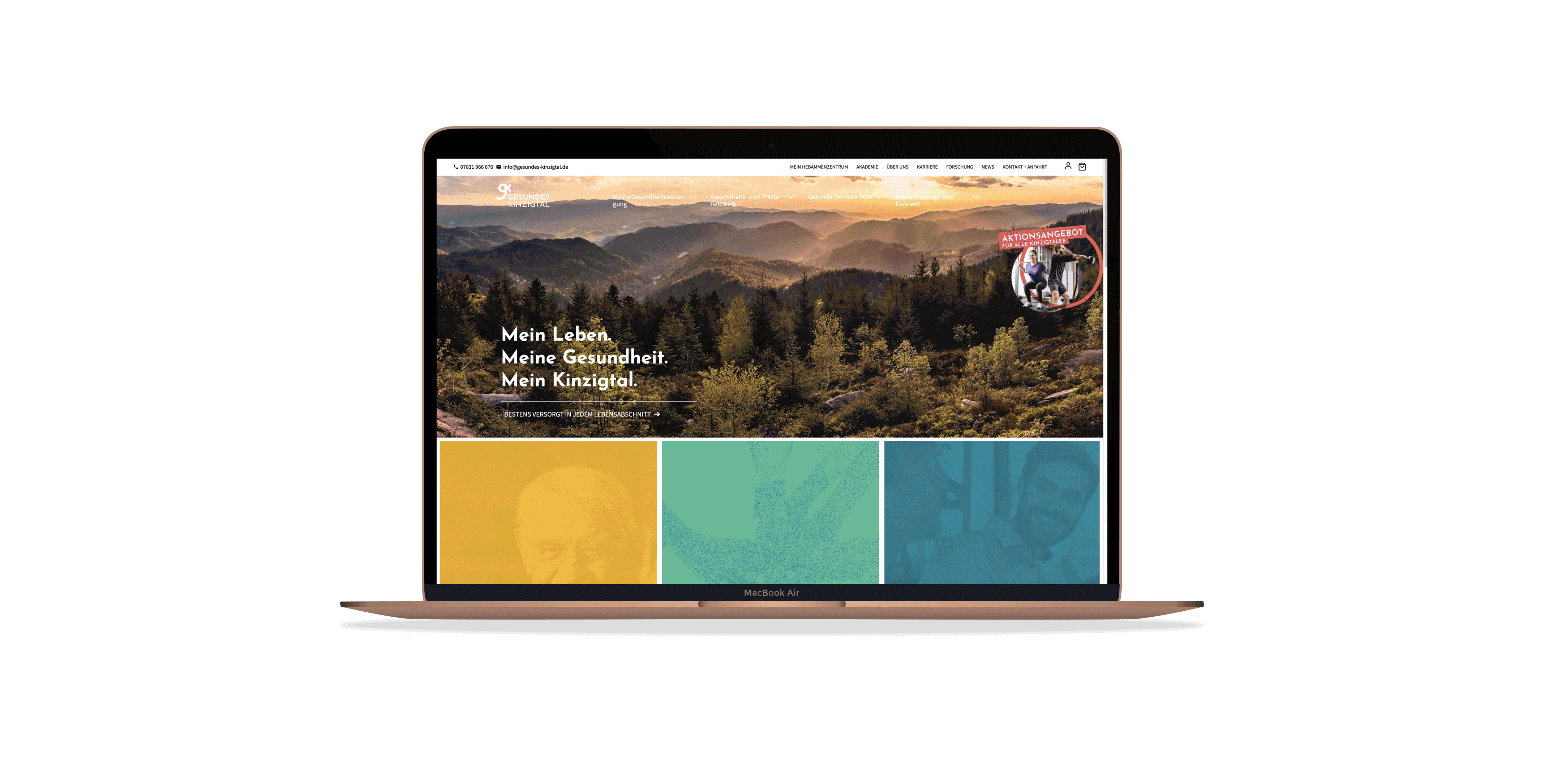 Ein MacBook Air, das eine Website mit einer malerischen Waldlandschaft, Text und bunten Gitterabschnitten darunter anzeigt.